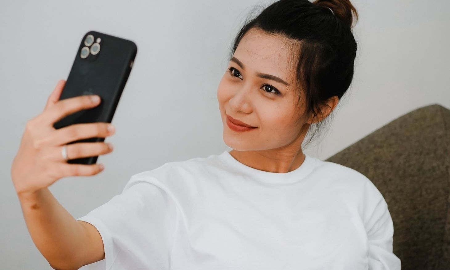 woman taking selfie