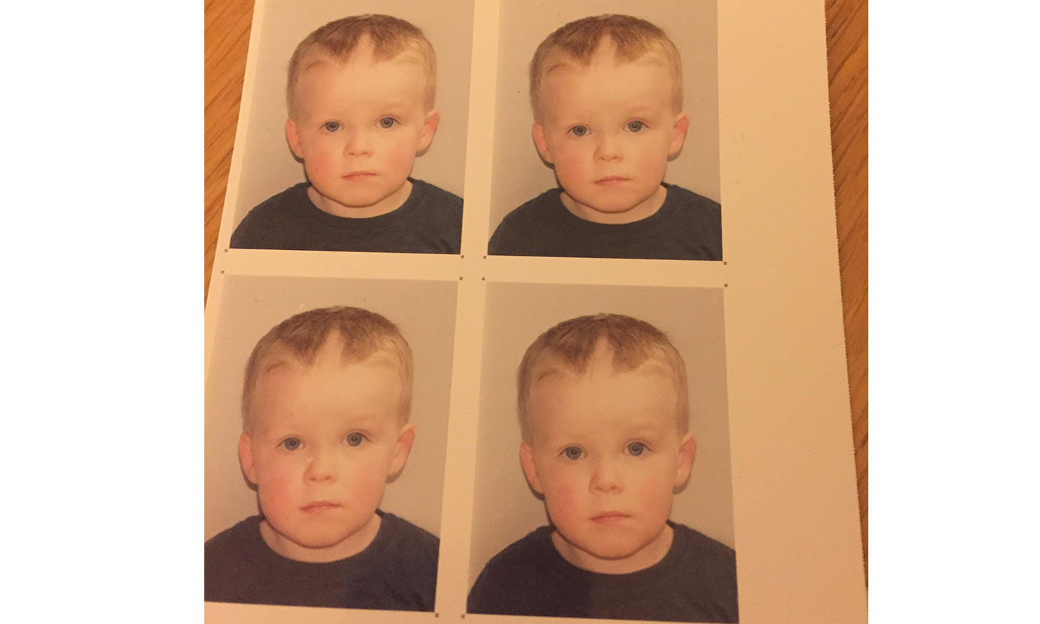 some passport photos of a kid with funny hairstyle