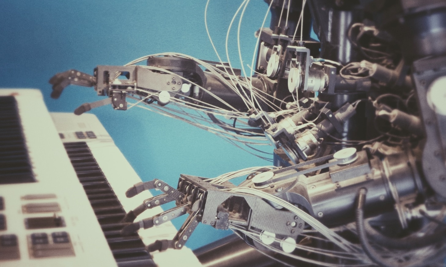 a robot equipped with an artificial intelligence module playing piano