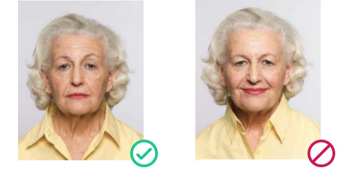 UK passport photo example: correct neutral expression with full face visible vs. invalid smiling picture 